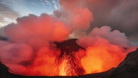 Lava fires out of the crater aat the top of Mount Yasur, Tanna island, Vanuatu