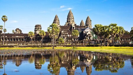TKPC - View of Angkor Wat across lake on a sunny day