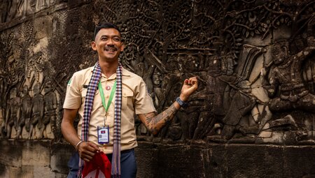 Leader Fila gives a talk about the carvings at Angkor Wat