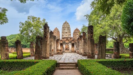 Wat Sri Sawai towers and entrance gate in Sukhothai Historical Park, a temple complex from the 14th century Sukhothai empire