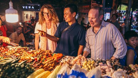 Vietnam insights with Peregrine Adventures: Sample local food at a street market