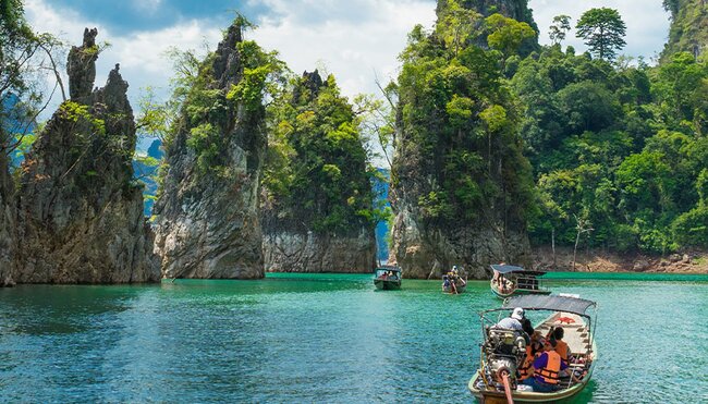 Travellers cruising through Khao Sok by boat