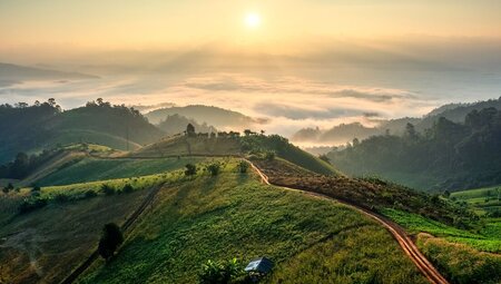 Green hill landscape during sun rise in Chiang Dao country side in Chiang Mai, Thailand