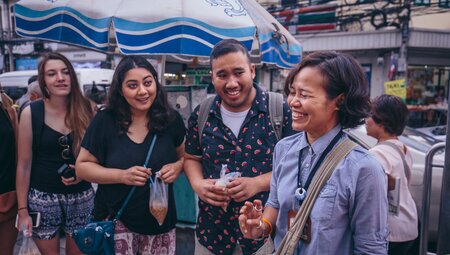 thailand bangkok group leader laugh