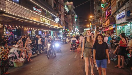 Walking the streets of Ho Chi Minh city with your local Intrepid leader