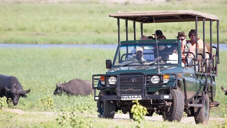 UBPB - Travellers on game drive spotting animals in Chobe NP, Botswana