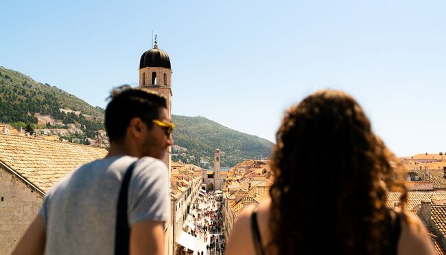 Intrepid travellers looking out over the main street of Dubrovnik, Croatia