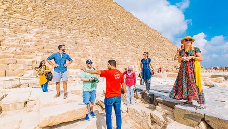 Intrepid group at the base of the pyramids, Cairo, Egypt