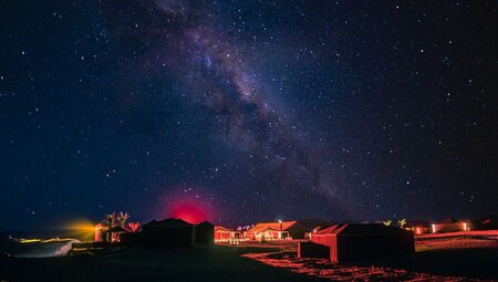 The Milky Way lights up over Lamnaouar Erg Camp in the Sahara