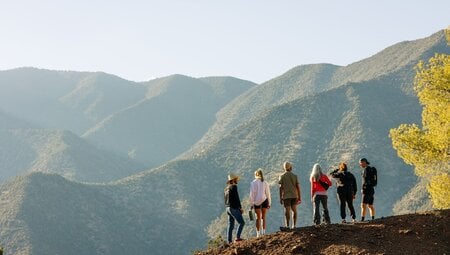 Travellers enjoying the view of the landscape in Ouirgane, Morocco