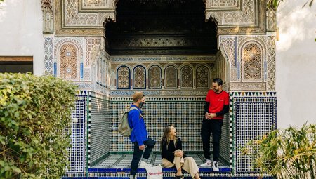 Leader and Intrepid travellers relax in a riad in Marrakech, Morocco