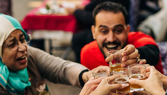 Group enjoying mint tea Marrakesh, Morocco