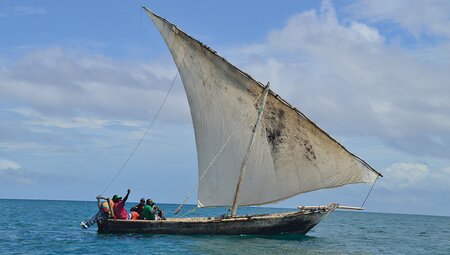 Fishermen sailing off the coast of Zanzibar