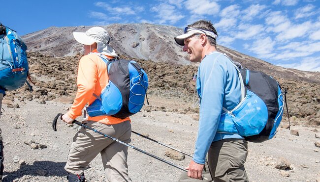 Travellers begin the hike to Mount Kilimanjaro