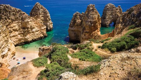 Stone pillars and cliffside paths to Algarve gorgeous beaches on the Portuguese coast