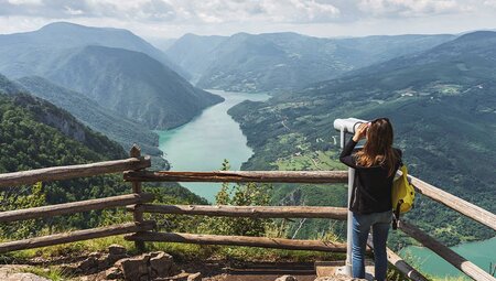 Female traveller looking out onto landscape of Tara National Park, Croatia