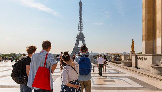 Group enjoy view of Eiffel tower from Trocadero, Paris, France