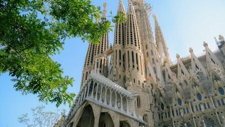 A daytime image of the Sagrada Familia in Barcelona, Spain.