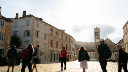 Intrepid leader guides travellers touring the island of Hvar off the Dalmatian Coast in Croatia