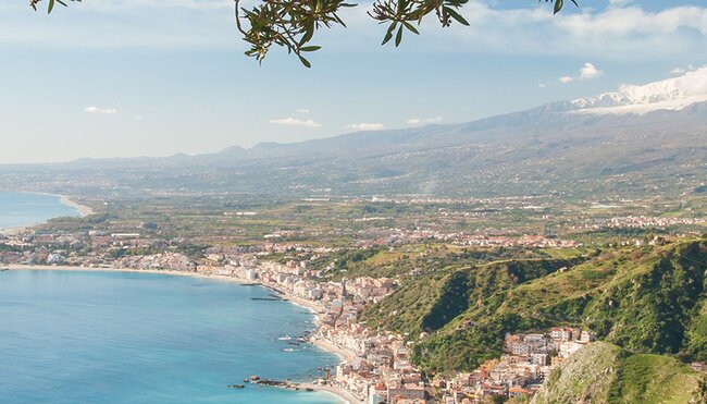 Mount Etna seen from a viewpoint of the roman theater in Taormina, Sicily