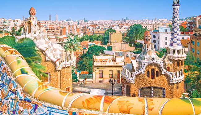 Colourful mosaic and buildings of Guell Park, Barcelona, Spain