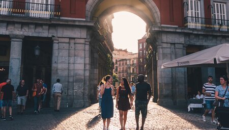 Travellers walking through the streets of Madrid, Spain