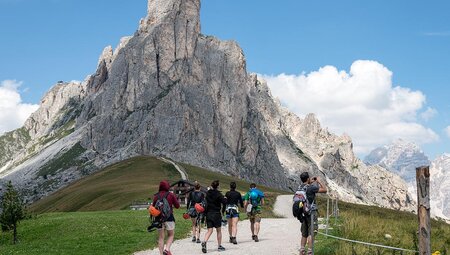 Group hiking in the Dolomites towards Tre Cime di Lavaredo