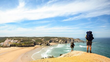 Hikers walking along Rota Vicentina coastline, Portugal