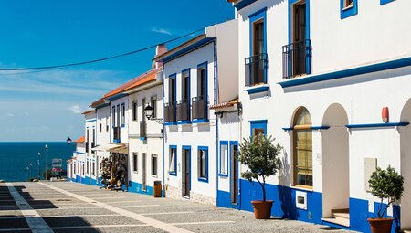 The colourful bright buildings of Porto Covo, Portugal