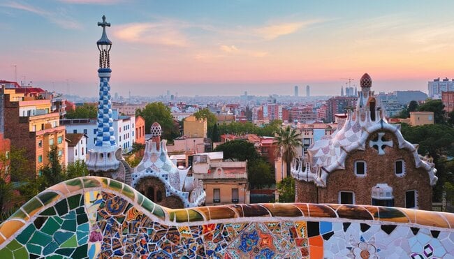 Guell Gaudi mosaic on building overlooking Barcelona