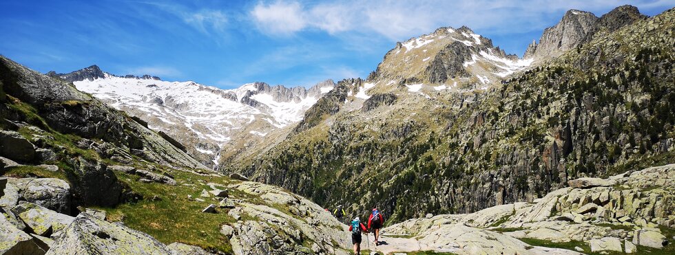 Wanderer bei Estany Travessani