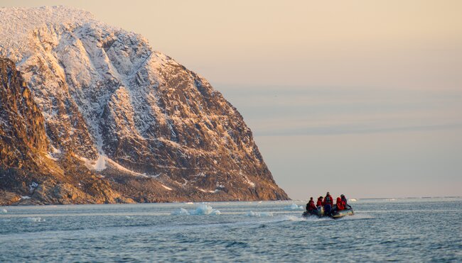 People in a Zodiac around Spitzbergen, Kvitoya, in August